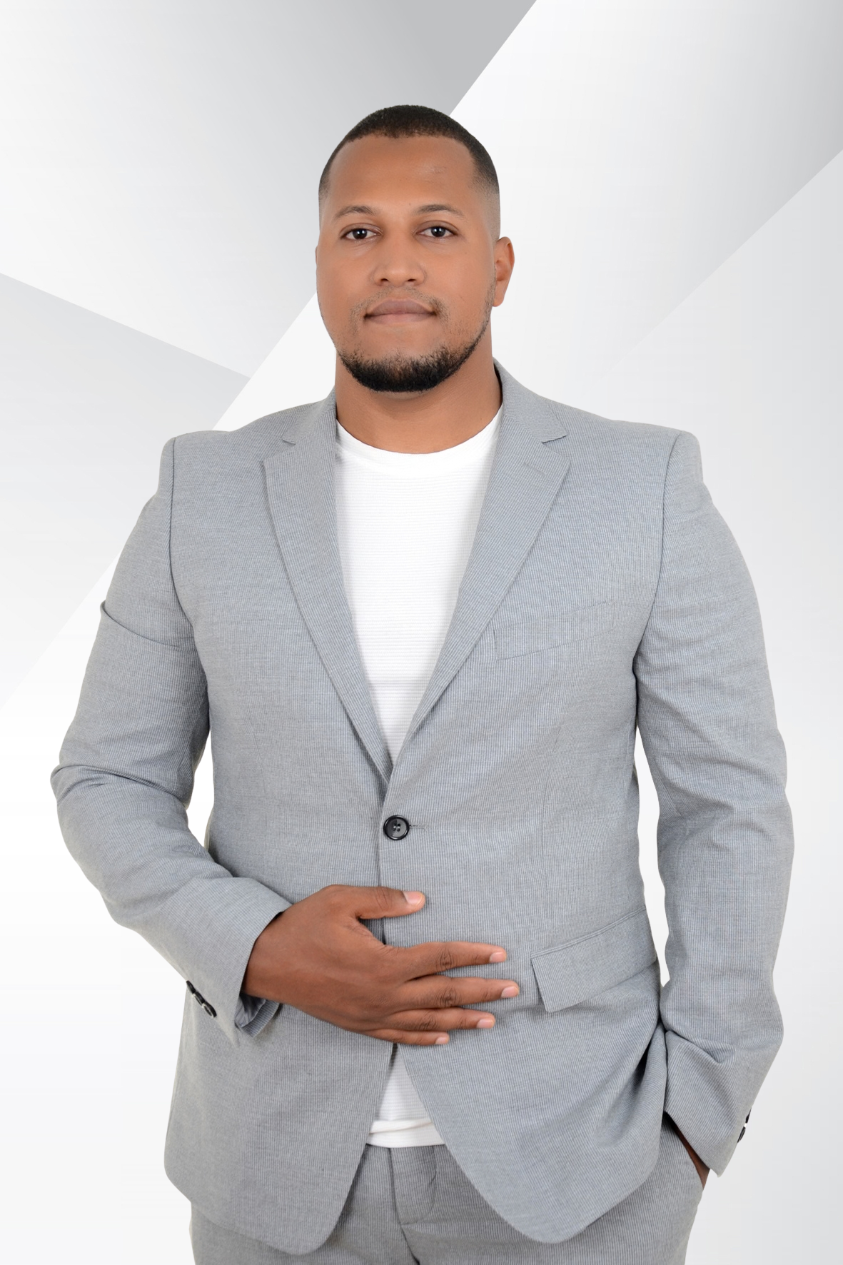 Zouhir Ammane wearing a light grey suit